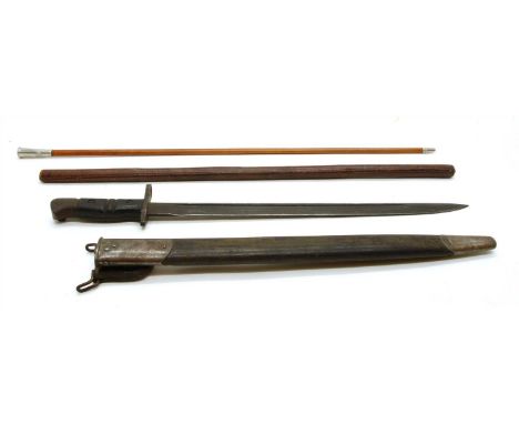 A 1913 P1917 original dated WWII Remington bayonet in scabbard, with two British swagger sticks