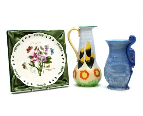 A collection of ceramic moulded jugs, together with a Portmerion cased plate and a Spode limited edition commemorative Covent