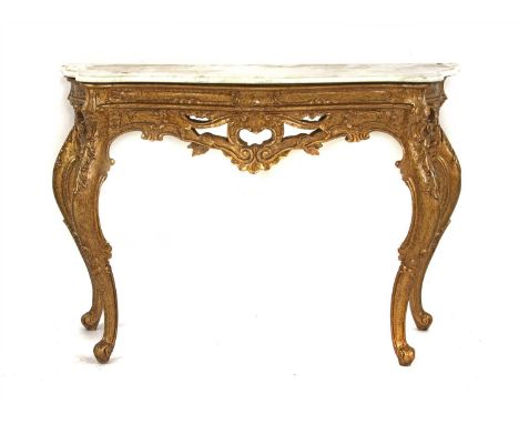 A Louis XV style gilt console table, the serpentine white marble top above pierced gallery, on cabriole supports, 127cm wide,