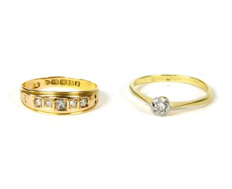 A gold five stone diamond ring,&nbsp;with a graduated row of Swiss cut and old eight cut diamonds, grain set in square collet