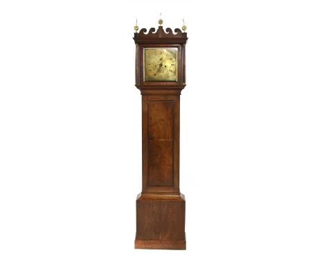 A George III mahogany eight day longcase clock , by David Rogers of Saffron Walden, the scrolling pediment with brass finials