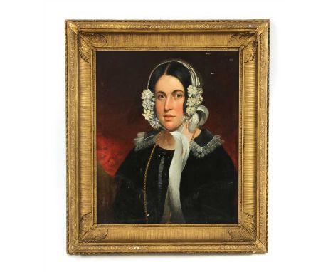 English School, mid 19th century PORTRAIT OF A YOUNG WOMAN, HALF LENGTH, IN A BLACK DRESS AND WHITE BONNET Oil on canvas 61 x