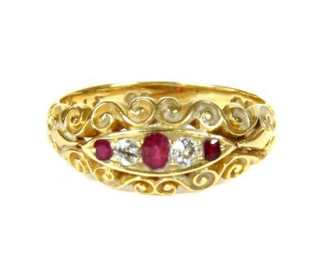 A Victorian 18ct gold ruby and diamond five stone boat shaped ring, with a row of alternating oval mixed cut rubies and Swiss