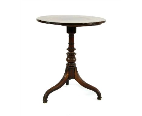 A 19th century mahogany lamp table, with reeded legs and turned column, 60cm diameter, 71cm high