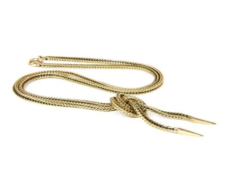 A gold fox tail knot necklace, with a two row knot and tassel centrepiece to bolt ring clasp, marked 10k, 11.33g