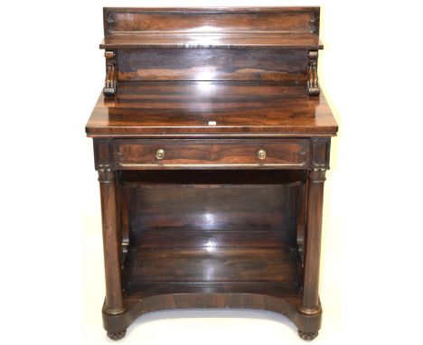 A GOOD LATE REGENCY ROSEWOOD SIDE CABINET with a shelf over a long drawer, lyre end supports, column supports and platform ba