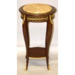 A LOUIS XVI BRONZE MOUNTED CIRCULAR MARBLE TOP STAND on four curving legs with under-tier. 2ft