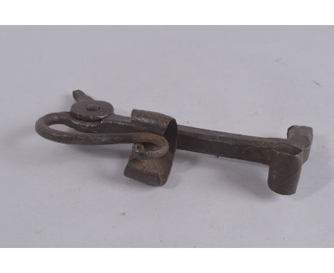 AN EARLY FORGED KNOCKER. 10ins high.