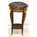 A LOUIS XVI BRONZE MOUNTED CIRCULAR MARBLE TOP STAND on four curving legs with under-tier. 2ft