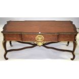 A LOUIS XVI STYLE RECTANGULAR TOP COFFEE TABLE with ormolu mounts, on four curving legs with cross