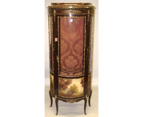 A LOUIS XVI STYLE BOWFRONTED VITRINE with three-quarter glass door and sides, over painted landscape panels, velvet interior,