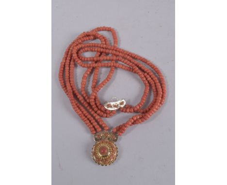 A VERY GOOD FOUR-ROW OF JADE BEADS with 14ct gold clasp.
