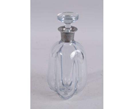 A SILVER TOP SWEDISH GLASS DECANTER AND STOPPER.