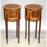 A PAIR OF LOUIS XVI STYLE INLAID CIRCULAR BEDSIDE TABLES with two drawers, on curving legs. 2ft 3ins