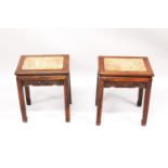 A PAIR OF CHINESE MARBLE INSET RECTANGULAR STANDS, 51cm high, top 41cm x 31cm.