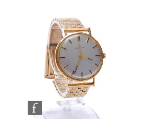 A 9ct hallmarked Certina manual wind wrist watch, batons to a circular silvered dial, case diameter 34mm, to a 9ct brick brac