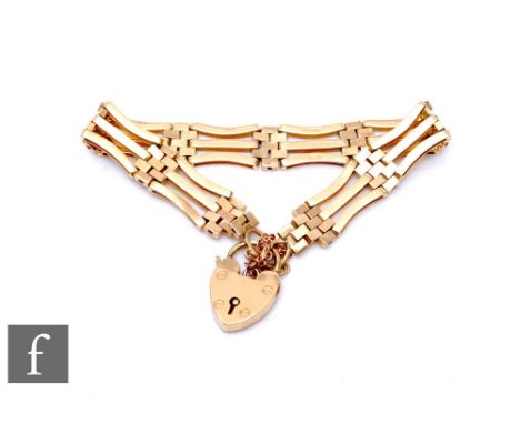 A 9ct hallmarked three bar gate bracelet, weight 17.5g, terminating in padlock fastener. 