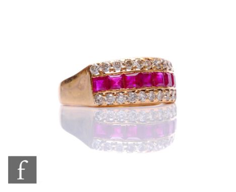 An 18ct ruby and diamond ring, a central row of seven square rubies flanked above and below by a row of diamonds, weight 6g, 
