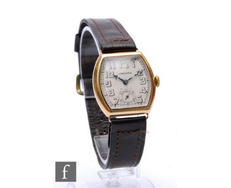 A 1940s 14ct Longines manual wind wrist watch, open Arabic numerals to a cushioned rectangular dial, case width 28mm, to a br
