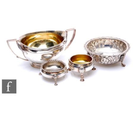 Four items of hallmarked silver to include a sugar basin, a small bowl and two open salts, total weight 18.5oz, various style