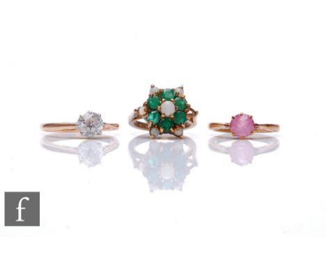 Three assorted 9ct stone set rings to include an emerald and opal cluster and two paste single stones, total weight 5.5g. (3)