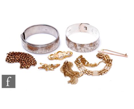 A small parcel lot of assorted 9ct silver items, total weight 20g, with two silver bangles, weight 60g, and a yellow metal ga