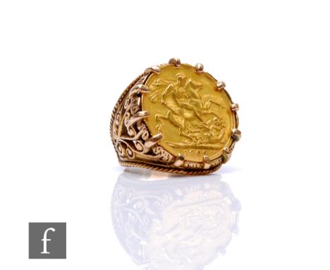 A 9ct hallmarked full sovereign ring, loose mounted coin dated 1909, to a pierced shank, total weight 17.5g, ring size N. 