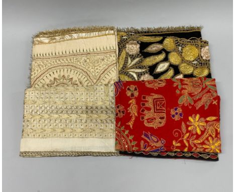 Four vintage Indian embroidered cloths and shawls in a vintage Harvey Nichols box dated 1936.