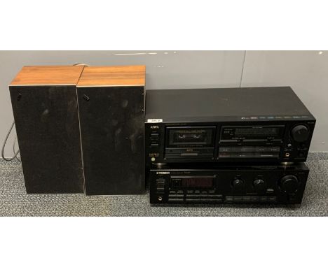 A vintage Aiwa tape deck with a Pioneer stereo receiver and a pair of speakers.