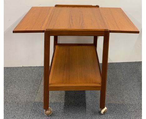 A vintage teak tea trolley/ table, 44 x 68 x 66cm opening to 87cm.