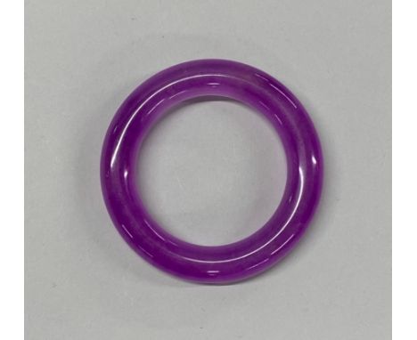 A Chinese lavender jade bangle, Dia. 1.5cm internal Dia. 6cm.