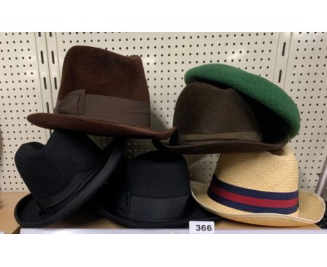 A group of vintage gentlemen's hats.