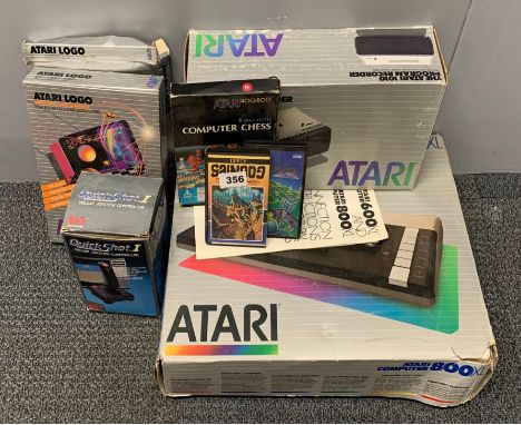 A vintage Atari 800 XL computer with program recorder etc.
