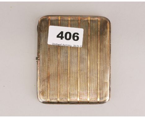 An Art Deco hallmarked silver and gold band cigarette case, 8 x 10cm.