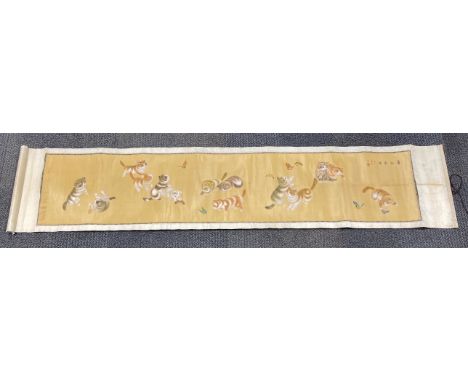 An old Chinese painting on fine linen mounted on a silk scroll depicting cats trying to catch butterflies, scroll size 40 x 1