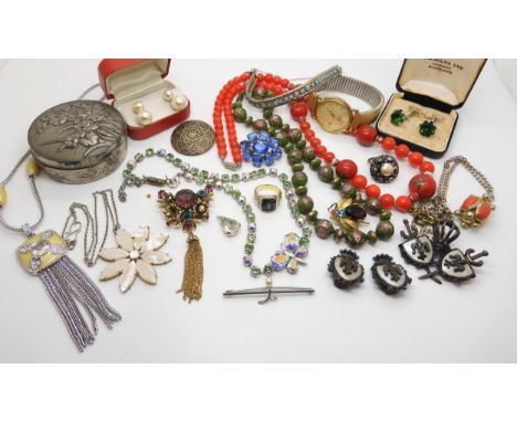 A collection of vintage costume jewellery to include Murano glass beads, a butterfly necklace and other items Condition Repor