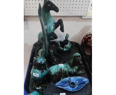 A Poole pottery vase and a collection of Blue Mountain pottery animal figures Condition Report:No condition report available.