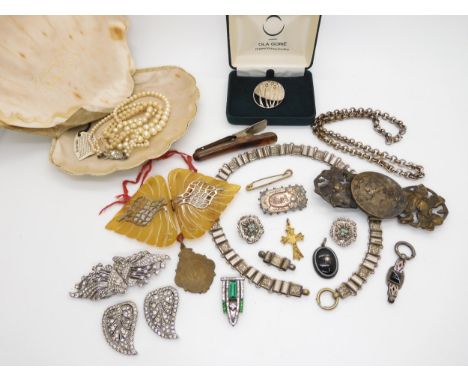A boxed silver Ola Gorie brooch,a vintage silver green glass deco clip, further deco clips and buckles one Art Nouveau exampl