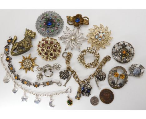 A 1751 One Dubloon gaming token, a silver Ward Brothers thistle brooch, a brass dog ornament and a collection of vintage cost