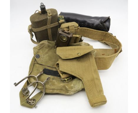 A collection of WW2-era webbing etc., comprising belt fitted with holster (dated 1942), ammo pound and torch; nickel spurs by