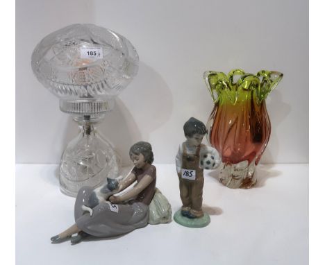 A crystal table lamp and shade, an art glass vase and two Nao figures Condition Report:Available upon request