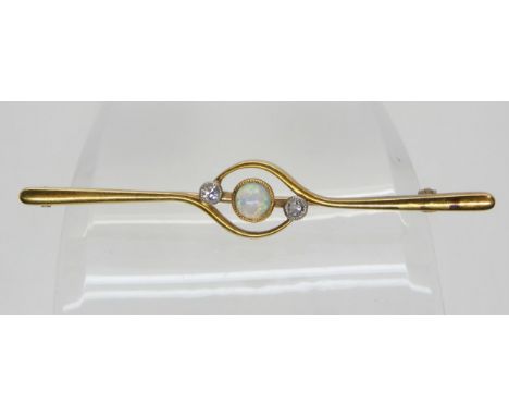 A 15ct gold diamond and opal twist bar brooch, set with estimated approx 0.10cts of diamonds. Length 6cm, weight 4.7gms Condi
