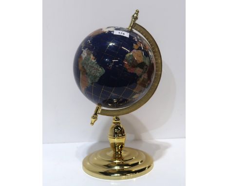 A medium hardstone globe of the world on gilt stand Condition Report:Available upon request