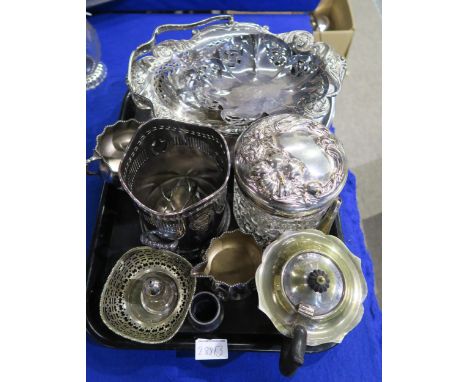 A collection of EPNS including swing handled baskets, a bottle coaster, teapot, a cut glass EPNS pot etc Condition Report:Ava