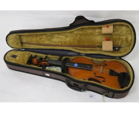 A two piece back violin by Stentor Romania with a bow and case, strings etc Condition Report:Available upon request