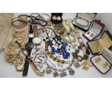 A collection of Vintage costume jewellery, to include cufflinks, a bowling tie clip and other items Condition Report:No condi