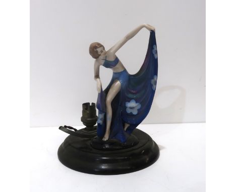 A German Art Deco pottery figure of a dancing girl, mounted on wooden lamp base, missing mirror&nbsp; Condition Report:Availa