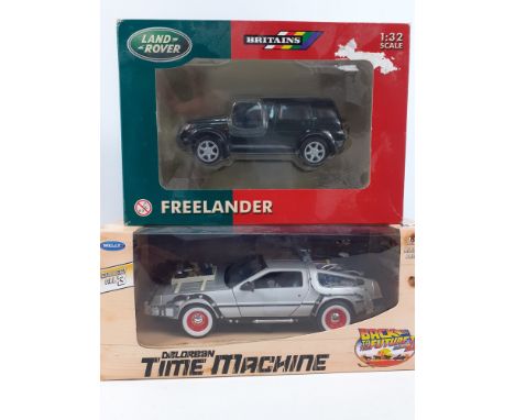 DELOREAN Time Machine BACK TO THE FUTURE 1:24 Die-cast by Welly still boxed and un-opened and also a BRITAINS FREELANDER 1:32