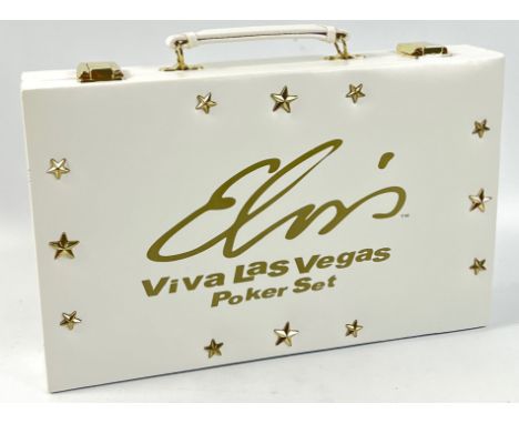 An ELVIS LAS VEGAS Poker Set, in a padded case, 4 strips of chips and 2 packs of Elvis cards are unopenedApprox 1 pieces