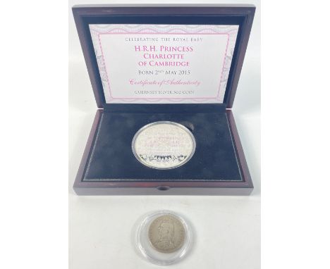 A collectable Guernsey Silver Princess Charlotte of Cambridge 2015 £10 5oz commemorative bullion mint coin within its origina